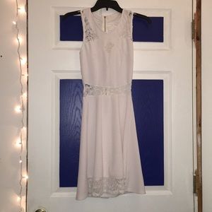 White dress with lace. Zip up back.